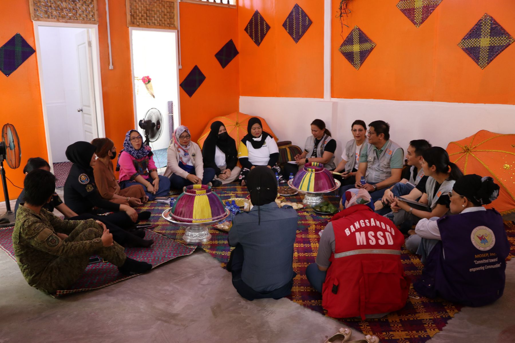 Government representatives and UNFPA meet at a Women-Friendly Space in Datu Saudi Ampatuan, Maguindanao del Sur.