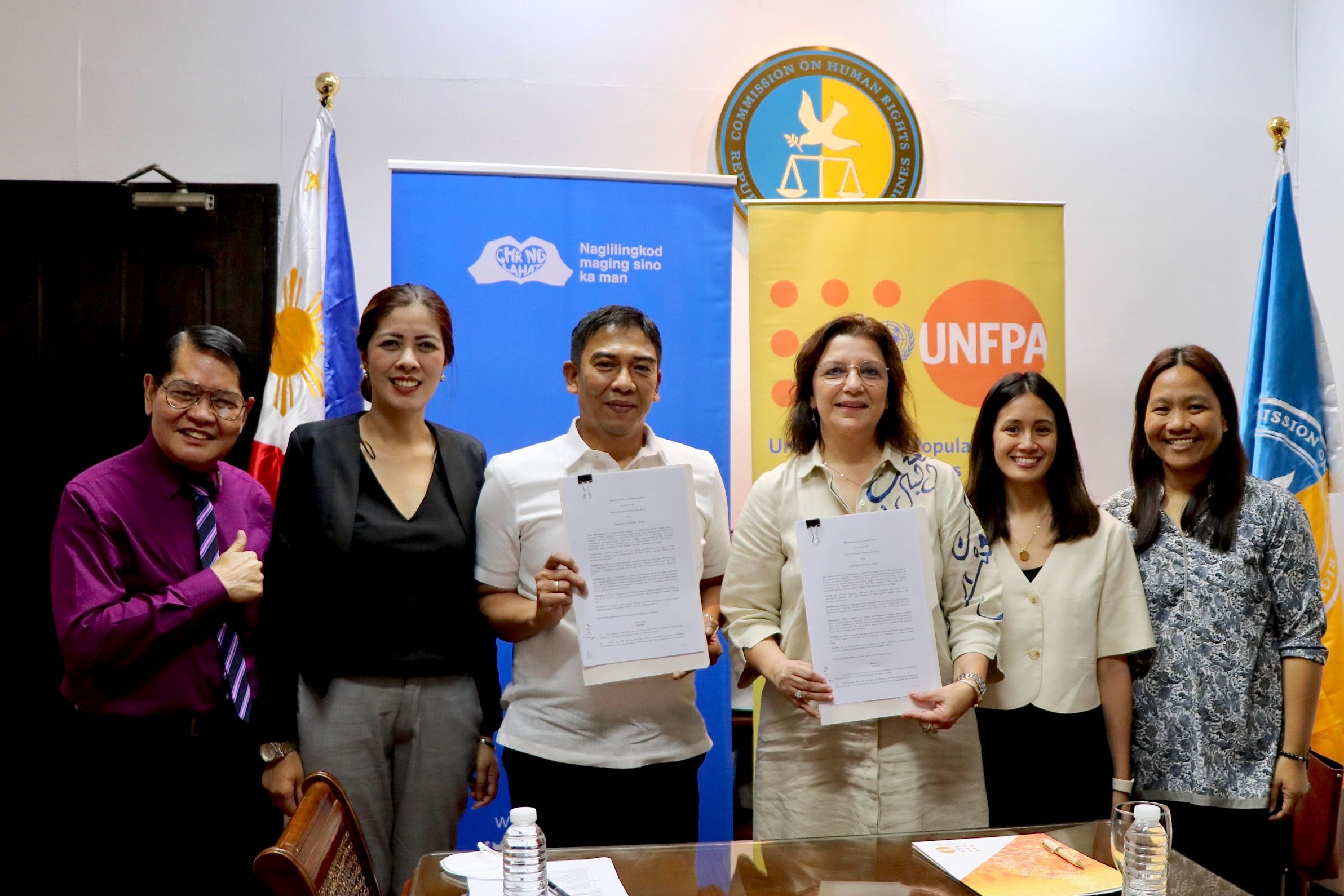 CHR and UNFPA after signing the memorandum of understanding