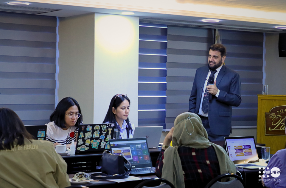UNFPA Expert speaking in front of participants