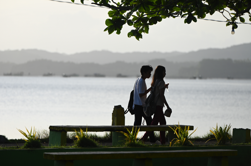 Two people walking together