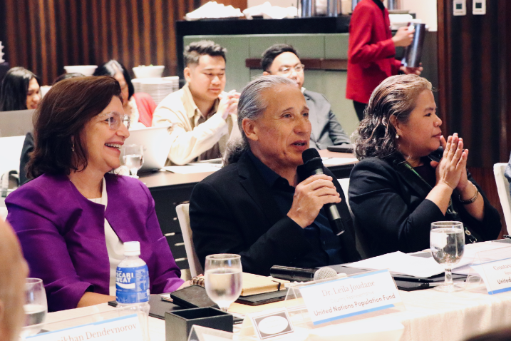 UN Philippines Resident Coordinator talking with UNFPA PH Country Representative and DOH representative by his side