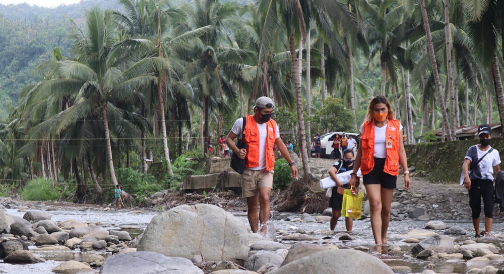 People crossing the river