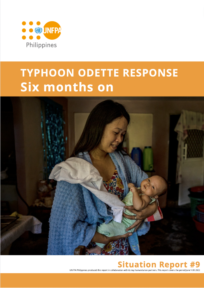 A woman carrying her baby in Southern Leyte Philippines UNFPA Six Months Report Odette Response