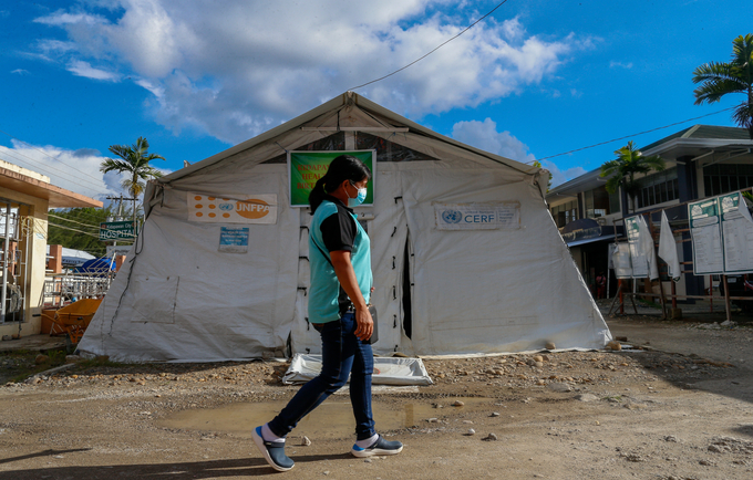 A health worker provides life-saving reproductive health services and oversees the maternal health tents provided by UNFPA in Ki