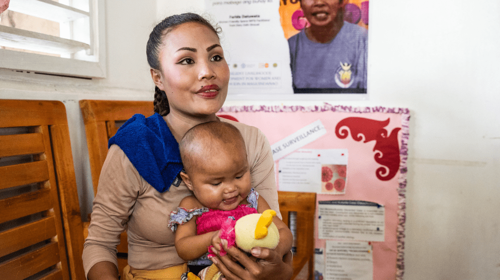 Bai Tata Hakim with baby Nasharad in the Women-Friendly Space in Datu Odin Sinsuat during an activity that teaches mothers in the community to address malnutrition. Photo: UNFPA Philippines / Ferdinandh Cabrera