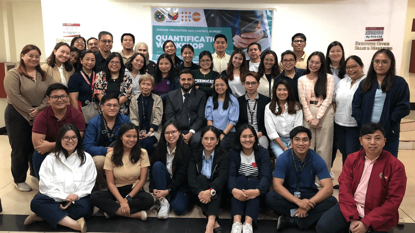 Attendees of the workshop pose for a group photo