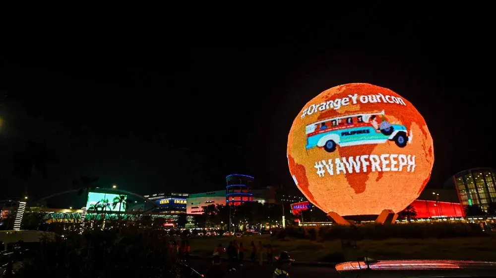 UNFPA, PCW, SM Cares kick off campaign to end violence against women by turning MOA globe, other mall LED displays orange